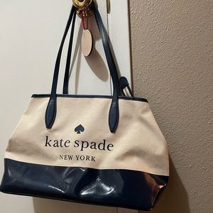 Kate spade shoulder bag with navy on bottom with canvas on top